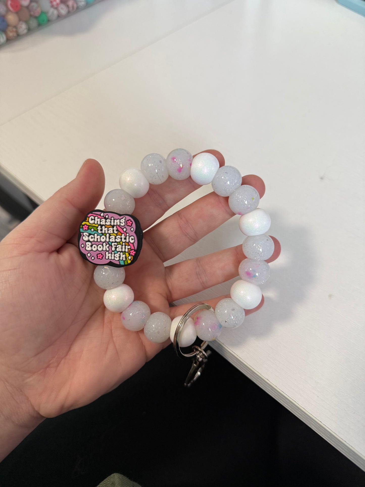 RTS chasing that scholastic book fair high wristlet