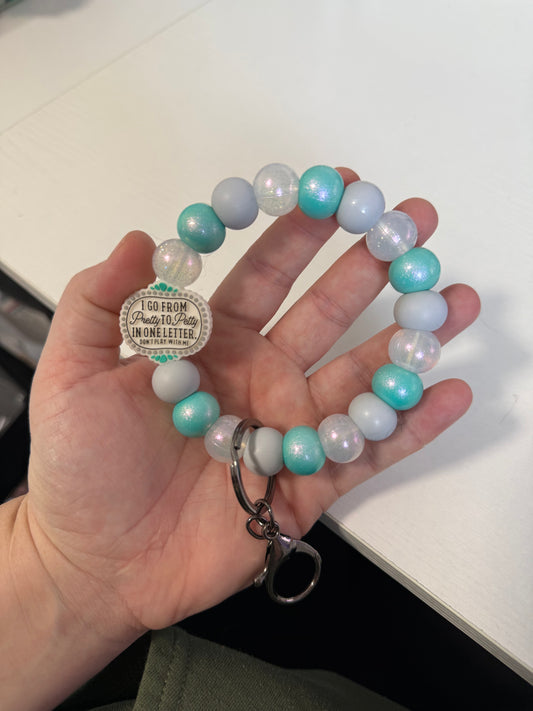 RTS I go from pretty to petty wristlet