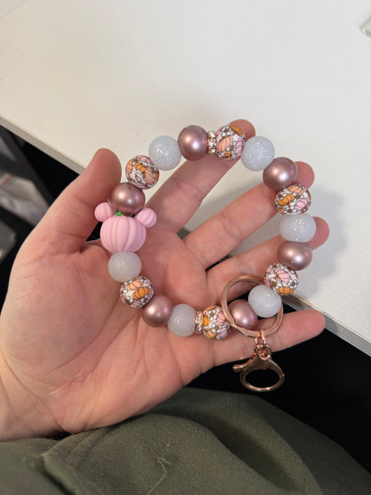 RTS blush mickey pumpkin wristlet